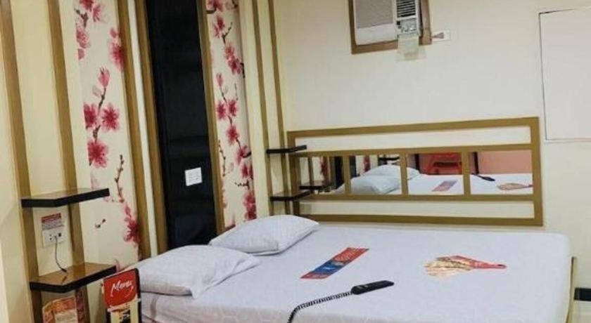 Hotel Sogo Tarlac Екстериор снимка